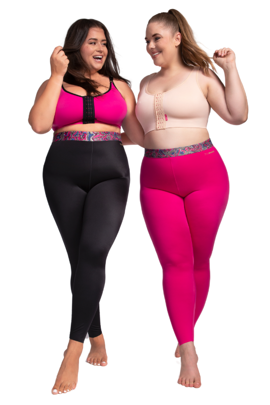 Zwei Frauen tragen die Kompressionsleggings ACTIVE leggings in Pink und Schwarz.